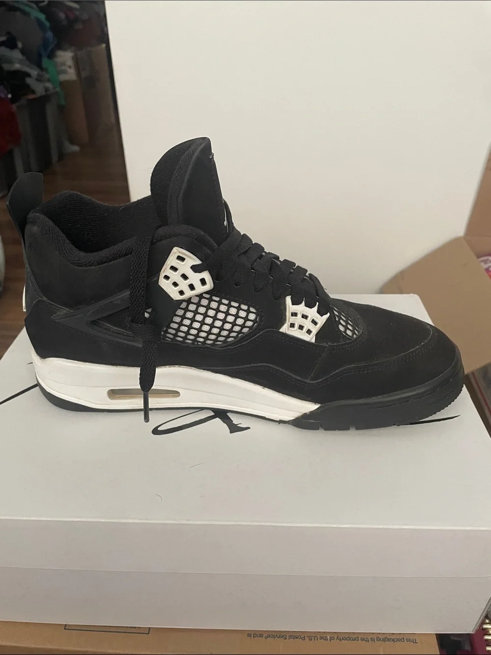 Black and White Jordan 4 Retro Thunder size 9  with box